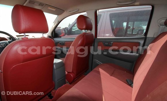 Sayi Imported Toyota Hilux Red Mota in Import - Dubai a Burkina Faso Sayi Imported Toyota Hilux Red Mota in Import - Dubai a Burkina Faso