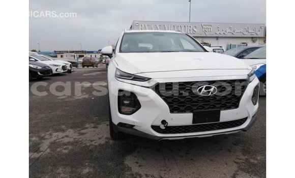 Sayi Imported Hyundai Santa Fe White Mota in Import - Dubai a Burkina Faso Sayi Imported Hyundai Santa Fe White Mota in Import - Dubai a Burkina Faso