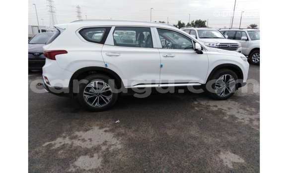 Sayi Imported Hyundai Santa Fe White Mota in Import - Dubai a Burkina Faso Sayi Imported Hyundai Santa Fe White Mota in Import - Dubai a Burkina Faso