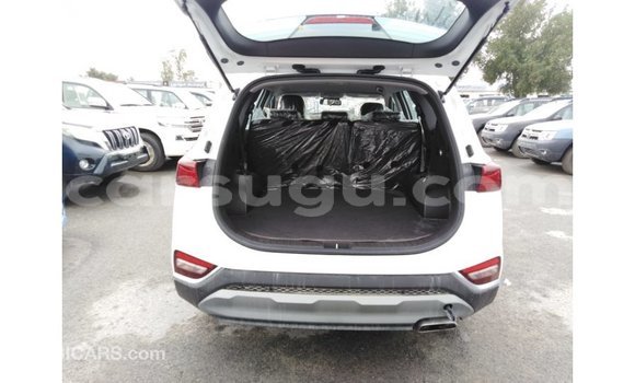 Sayi Imported Hyundai Santa Fe White Mota in Import - Dubai a Burkina Faso Sayi Imported Hyundai Santa Fe White Mota in Import - Dubai a Burkina Faso