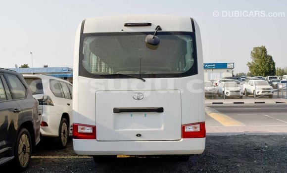 Sayi Imported Toyota Coaster White Mota in Import - Dubai a Burkina Faso Sayi Imported Toyota Coaster White Mota in Import - Dubai a Burkina Faso