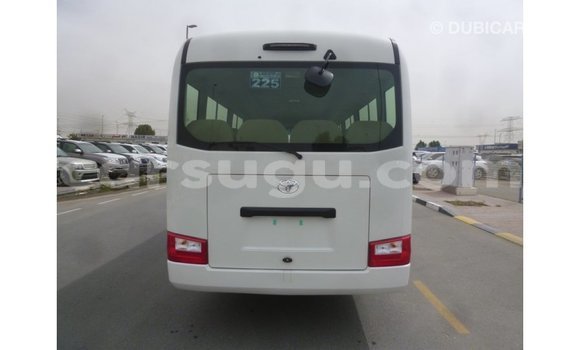 Sayi Imported Toyota Coaster White Mota in Import - Dubai a Burkina Faso Sayi Imported Toyota Coaster White Mota in Import - Dubai a Burkina Faso
