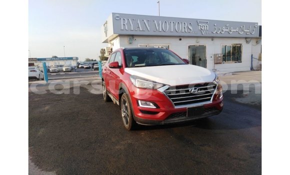 Sayi Imported Hyundai Tucson Red Mota in Import - Dubai a Burkina Faso Sayi Imported Hyundai Tucson Red Mota in Import - Dubai a Burkina Faso