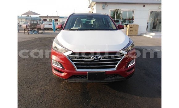 Sayi Imported Hyundai Tucson Red Mota in Import - Dubai a Burkina Faso Sayi Imported Hyundai Tucson Red Mota in Import - Dubai a Burkina Faso