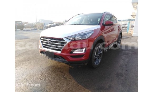Sayi Imported Hyundai Tucson Red Mota in Import - Dubai a Burkina Faso Sayi Imported Hyundai Tucson Red Mota in Import - Dubai a Burkina Faso