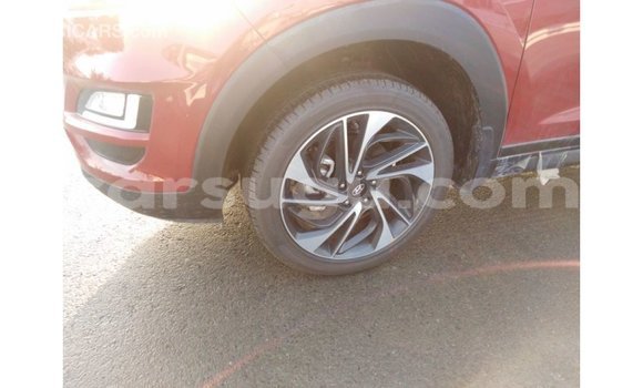 Sayi Imported Hyundai Tucson Red Mota in Import - Dubai a Burkina Faso Sayi Imported Hyundai Tucson Red Mota in Import - Dubai a Burkina Faso