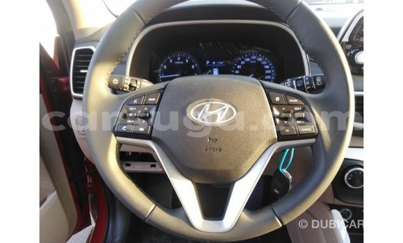 Sayi Imported Hyundai Tucson Red Mota in Import - Dubai a Burkina Faso Sayi Imported Hyundai Tucson Red Mota in Import - Dubai a Burkina Faso