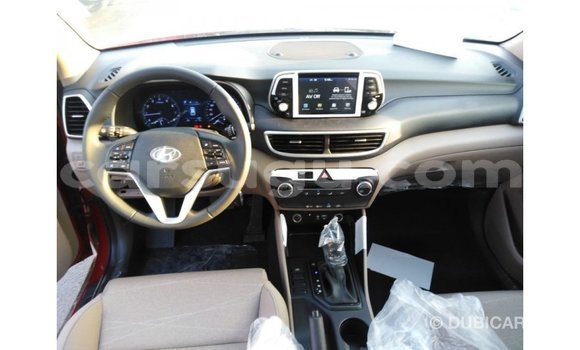 Sayi Imported Hyundai Tucson Red Mota in Import - Dubai a Burkina Faso Sayi Imported Hyundai Tucson Red Mota in Import - Dubai a Burkina Faso