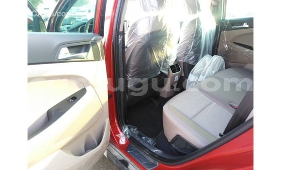 Sayi Imported Hyundai Tucson Red Mota in Import - Dubai a Burkina Faso Sayi Imported Hyundai Tucson Red Mota in Import - Dubai a Burkina Faso