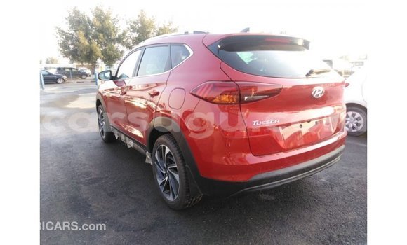 Sayi Imported Hyundai Tucson Red Mota in Import - Dubai a Burkina Faso Sayi Imported Hyundai Tucson Red Mota in Import - Dubai a Burkina Faso