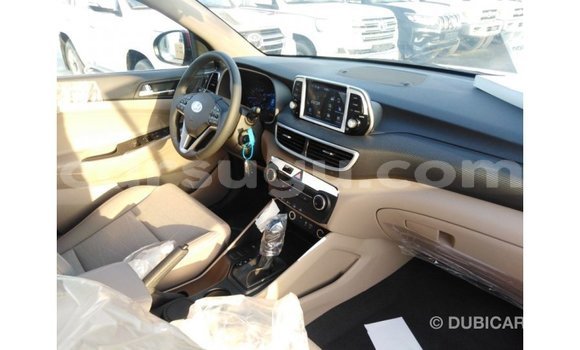 Sayi Imported Hyundai Tucson Red Mota in Import - Dubai a Burkina Faso Sayi Imported Hyundai Tucson Red Mota in Import - Dubai a Burkina Faso