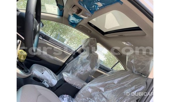 Sayi Imported Hyundai Elantra White Mota in Import - Dubai a Burkina Faso Sayi Imported Hyundai Elantra White Mota in Import - Dubai a Burkina Faso