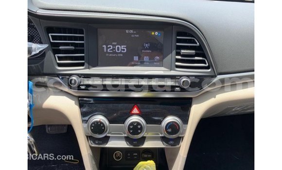 Sayi Imported Hyundai Elantra White Mota in Import - Dubai a Burkina Faso Sayi Imported Hyundai Elantra White Mota in Import - Dubai a Burkina Faso