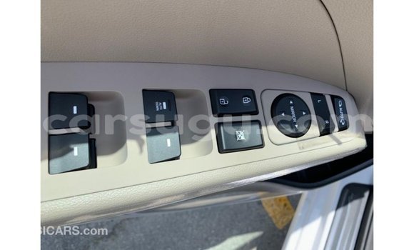 Sayi Imported Hyundai Elantra White Mota in Import - Dubai a Burkina Faso Sayi Imported Hyundai Elantra White Mota in Import - Dubai a Burkina Faso