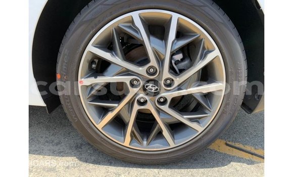 Sayi Imported Hyundai Elantra White Mota in Import - Dubai a Burkina Faso Sayi Imported Hyundai Elantra White Mota in Import - Dubai a Burkina Faso