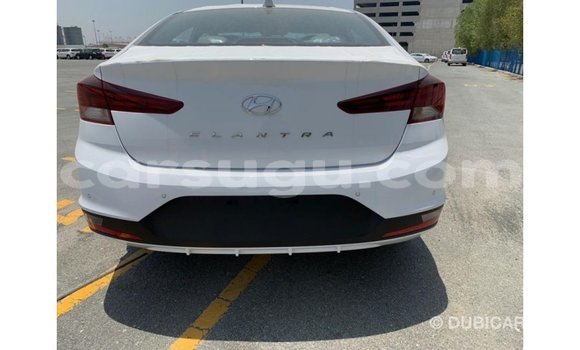 Sayi Imported Hyundai Elantra White Mota in Import - Dubai a Burkina Faso Sayi Imported Hyundai Elantra White Mota in Import - Dubai a Burkina Faso