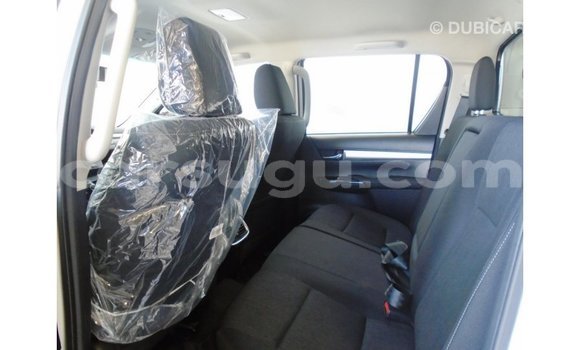 Buy Import Toyota Hilux White Car in Import - Dubai in Burkina Faso Buy Import Toyota Hilux White Car in Import - Dubai in Burkina Faso