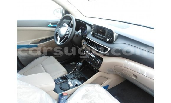 Sayi Imported Hyundai Tucson White Mota in Import - Dubai a Burkina Faso Sayi Imported Hyundai Tucson White Mota in Import - Dubai a Burkina Faso