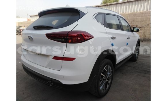 Sayi Imported Hyundai Tucson White Mota in Import - Dubai a Burkina Faso Sayi Imported Hyundai Tucson White Mota in Import - Dubai a Burkina Faso