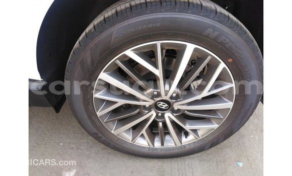 Sayi Imported Hyundai Tucson White Mota in Import - Dubai a Burkina Faso Sayi Imported Hyundai Tucson White Mota in Import - Dubai a Burkina Faso