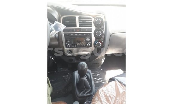 Sayi Imported Kia Carens White Mota in Import - Dubai a Burkina Faso Sayi Imported Kia Carens White Mota in Import - Dubai a Burkina Faso