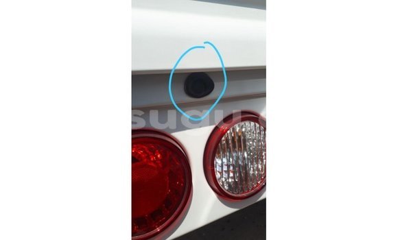 Sayi Imported Kia Carens White Mota in Import - Dubai a Burkina Faso Sayi Imported Kia Carens White Mota in Import - Dubai a Burkina Faso