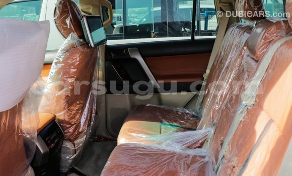 Acheter Import Voiture Toyota Prado Rouge à Import - Dubai, Burkina-Faso Acheter Import Voiture Toyota Prado Rouge à Import - Dubai, Burkina-Faso
