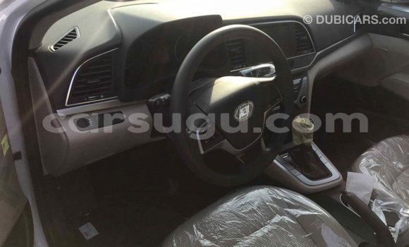 Sayi Imported Hyundai Elantra White Mota in Import - Dubai a Burkina Faso Sayi Imported Hyundai Elantra White Mota in Import - Dubai a Burkina Faso