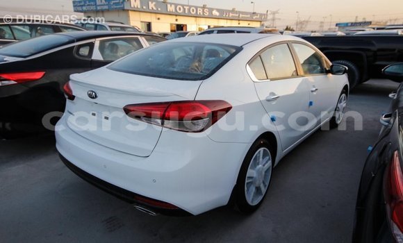 Sayi Imported Kia Cerato White Mota in Import - Dubai a Burkina Faso Sayi Imported Kia Cerato White Mota in Import - Dubai a Burkina Faso