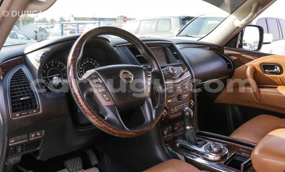 Sayi Imported Nissan Patrol White Mota in Import - Dubai a Burkina Faso Sayi Imported Nissan Patrol White Mota in Import - Dubai a Burkina Faso