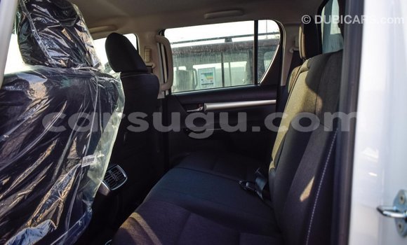 Buy Import Toyota Hilux White Car in Import - Dubai in Burkina Faso Buy Import Toyota Hilux White Car in Import - Dubai in Burkina Faso