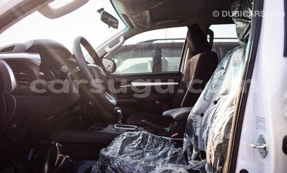 Buy Import Toyota Hilux White Car in Import - Dubai in Burkina Faso Buy Import Toyota Hilux White Car in Import - Dubai in Burkina Faso