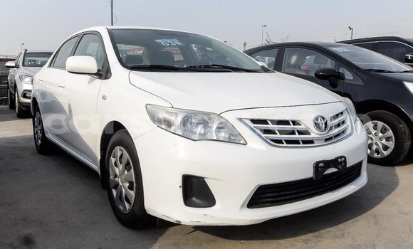 Sayi Imported Toyota Corolla White Mota in Import - Dubai a Burkina Faso Sayi Imported Toyota Corolla White Mota in Import - Dubai a Burkina Faso