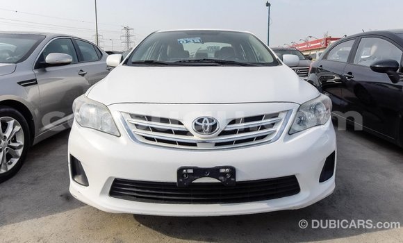 Sayi Imported Toyota Corolla White Mota in Import - Dubai a Burkina Faso Sayi Imported Toyota Corolla White Mota in Import - Dubai a Burkina Faso
