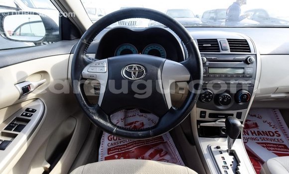 Sayi Imported Toyota Corolla White Mota in Import - Dubai a Burkina Faso Sayi Imported Toyota Corolla White Mota in Import - Dubai a Burkina Faso