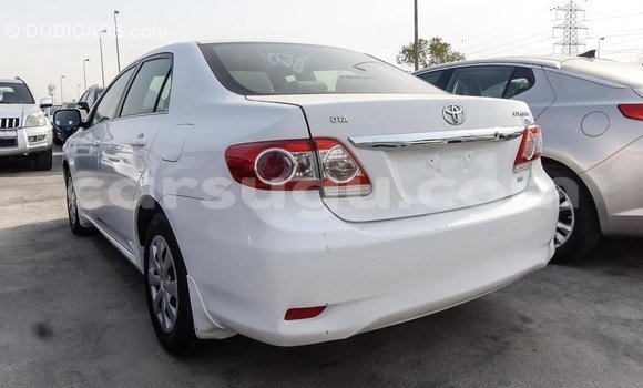 Sayi Imported Toyota Corolla White Mota in Import - Dubai a Burkina Faso Sayi Imported Toyota Corolla White Mota in Import - Dubai a Burkina Faso