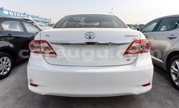 Sayi Imported Toyota Corolla White Mota in Import - Dubai a Burkina Faso Sayi Imported Toyota Corolla White Mota in Import - Dubai a Burkina Faso