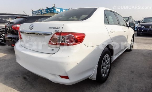 Sayi Imported Toyota Corolla White Mota in Import - Dubai a Burkina Faso Sayi Imported Toyota Corolla White Mota in Import - Dubai a Burkina Faso