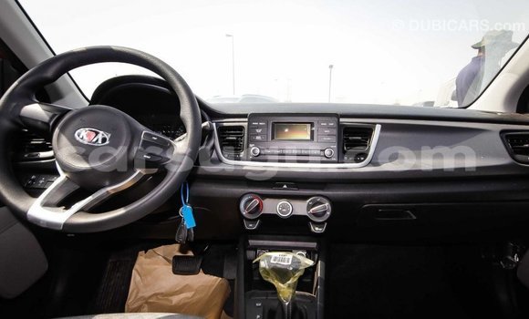 Acheter Import Voiture Kia Rio Rouge à Import - Dubai, Burkina-Faso Acheter Import Voiture Kia Rio Rouge à Import - Dubai, Burkina-Faso