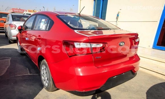 Sayi Imported Kia Rio Red Mota in Import - Dubai a Burkina Faso Sayi Imported Kia Rio Red Mota in Import - Dubai a Burkina Faso