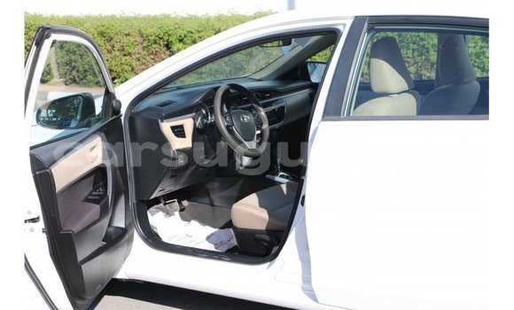 Sayi Imported Toyota Corolla White Mota in Import - Dubai a Burkina Faso Sayi Imported Toyota Corolla White Mota in Import - Dubai a Burkina Faso