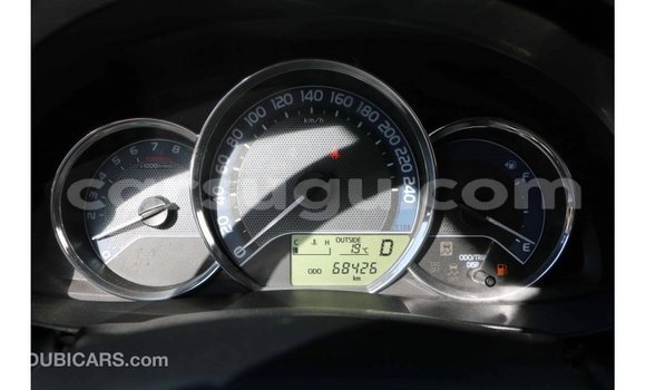 Sayi Imported Toyota Corolla White Mota in Import - Dubai a Burkina Faso Sayi Imported Toyota Corolla White Mota in Import - Dubai a Burkina Faso