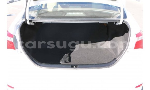 Sayi Imported Toyota Corolla White Mota in Import - Dubai a Burkina Faso Sayi Imported Toyota Corolla White Mota in Import - Dubai a Burkina Faso