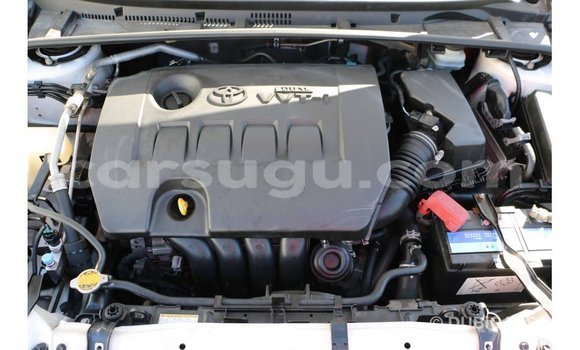 Sayi Imported Toyota Corolla White Mota in Import - Dubai a Burkina Faso Sayi Imported Toyota Corolla White Mota in Import - Dubai a Burkina Faso