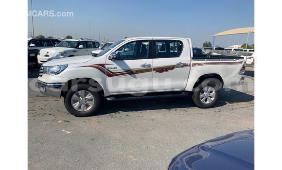Acheter Import Voiture Toyota Hilux Blanc à Import - Dubai, Burkina-Faso Acheter Import Voiture Toyota Hilux Blanc à Import - Dubai, Burkina-Faso