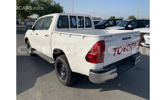Acheter Import Voiture Toyota Hilux Blanc à Import - Dubai, Burkina-Faso Acheter Import Voiture Toyota Hilux Blanc à Import - Dubai, Burkina-Faso