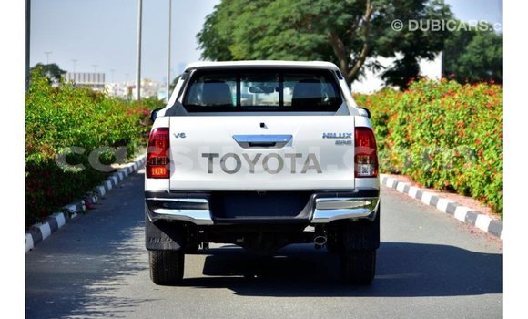 Sayi Imported Toyota Hilux White Mota in Import - Dubai a Burkina Faso Sayi Imported Toyota Hilux White Mota in Import - Dubai a Burkina Faso