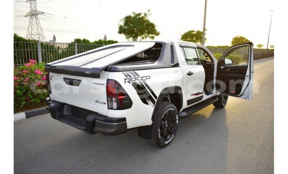 Buy Import Toyota Hilux White Car in Import - Dubai in Burkina Faso Buy Import Toyota Hilux White Car in Import - Dubai in Burkina Faso