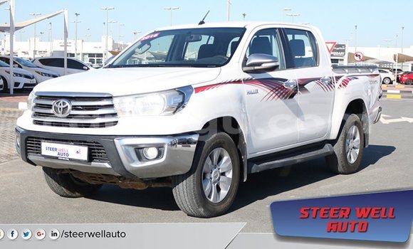 Sayi Imported Toyota Hilux White Mota in Import - Dubai a Burkina Faso Sayi Imported Toyota Hilux White Mota in Import - Dubai a Burkina Faso