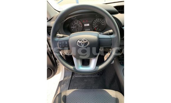Sayi Imported Toyota Hilux White Mota in Import - Dubai a Burkina Faso Sayi Imported Toyota Hilux White Mota in Import - Dubai a Burkina Faso